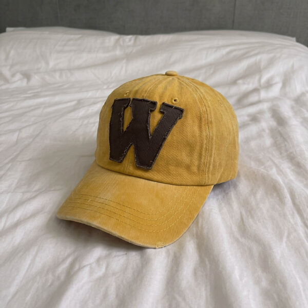 w yellow cap